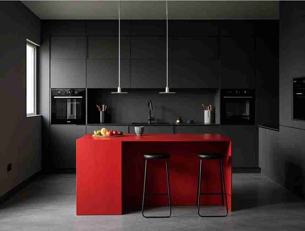 2. All-Black Kitchen with a Red Statement Island