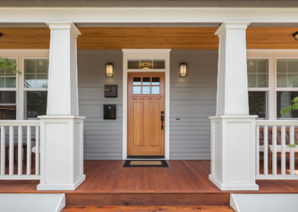 Earthy neutral front door paint colors are inviting.