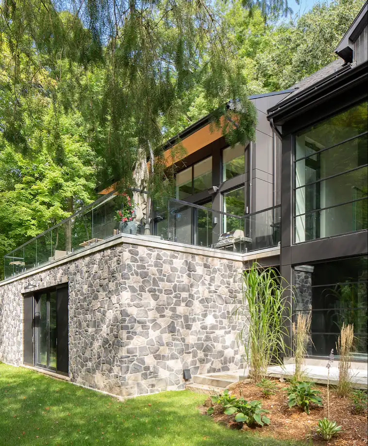 Canada private residence modern exterior and natural site context with mature greenery