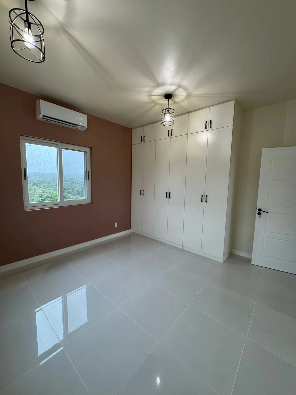 Guam Villa wardrobe with black handle details by George Group China