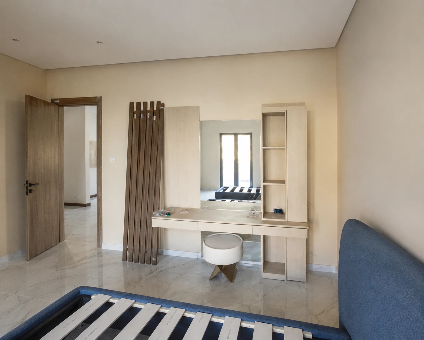 High-end beds, seating pieces, and soft furnishings coordinated for private villa