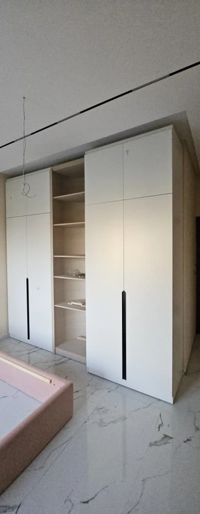 Bedroom interior showcasing full-house material coordination