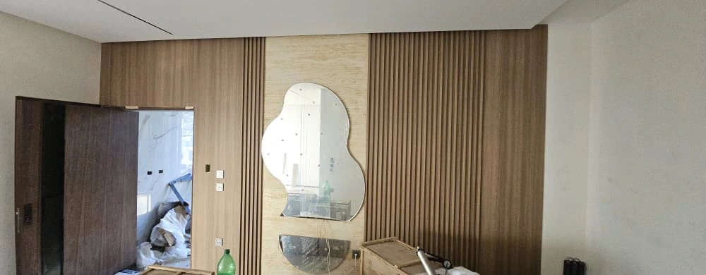 Coordinated living space with custom feature walls and flooring