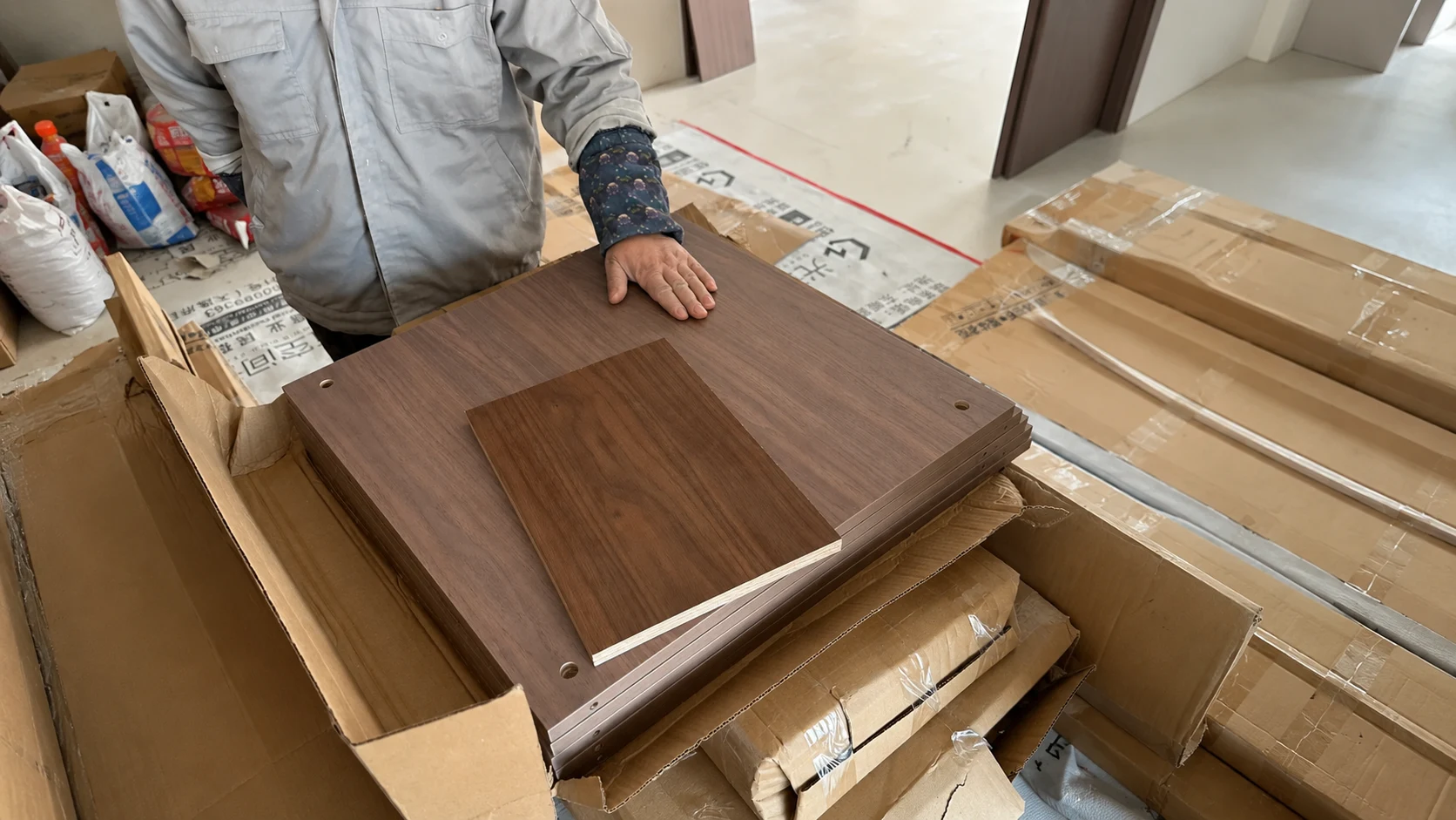Comparing finishes colors textures and hardware before confirming villa and apartment materials